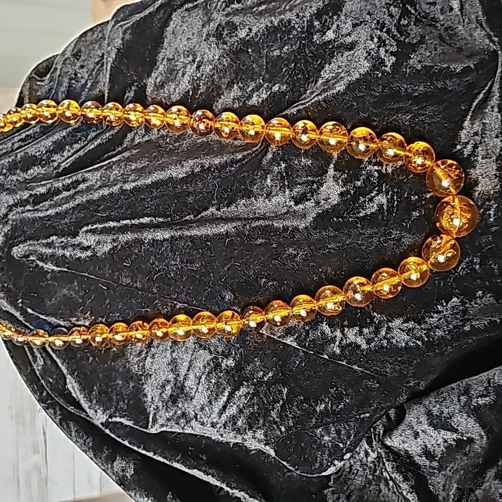 Amber Ladies Vintage Necklace 22inches in length.